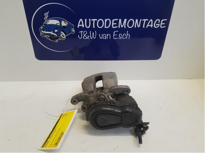 Rear brake calliper, left from a Mercedes-Benz A (W176) 1.6 A-180 16V 2013