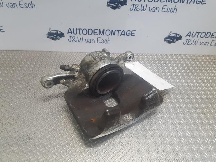 Front brake calliper, left from a Volkswagen Golf VIII (CD1) 1.5 TSI BlueMotion 16V 2020