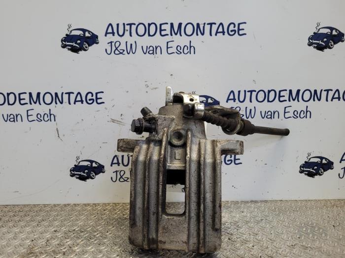 Rear brake calliper, left from a Volkswagen Golf IV Variant (1J5) 1.6 16V 2000