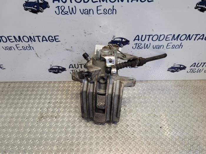 Rear brake calliper, left from a Volkswagen Golf IV Variant (1J5) 1.6 16V 2000