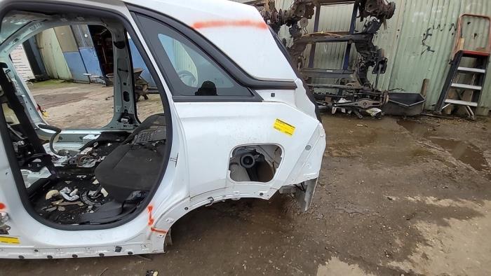 Metal cutting part left rear from a Opel Crossland/Crossland X 1.2 Turbo 12V Euro 6 2019