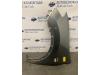 Front wing, left from a Nissan Qashqai (J10) 1.5 dCi 2011