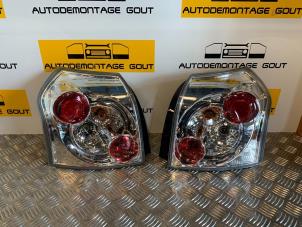 Used Set of taillights, left + right Toyota Corolla (E12) Price € 35,00 Margin scheme offered by Autodemontage Gout
