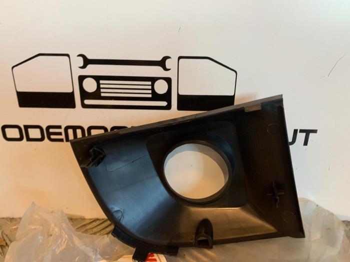 Plaque de protection feu antibrouillard gauche d'un Fiat 500 (312)  2010