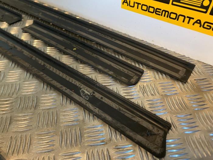 Door sill left from a Audi A3 Sportback (8PA)  2010