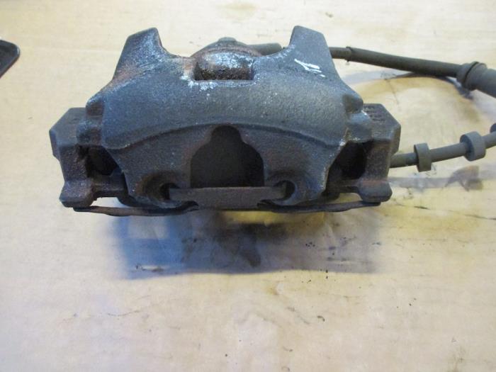 Front brake calliper, left from a Land Rover Range Rover Evoque (LVJ/LVS)  2012