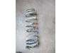 Rear coil spring from a Jaguar XF (X260) 2.0d 180 16V AWD 2016