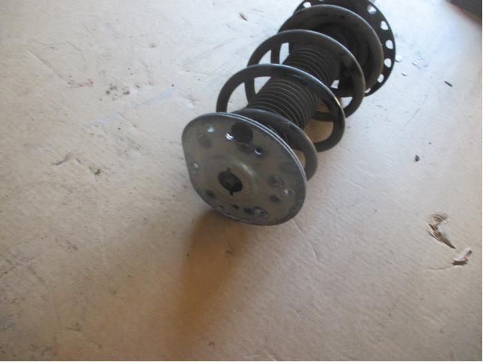 Fronts shock absorber, left from a Land Rover Range Rover Evoque (LVJ/LVS)  2012