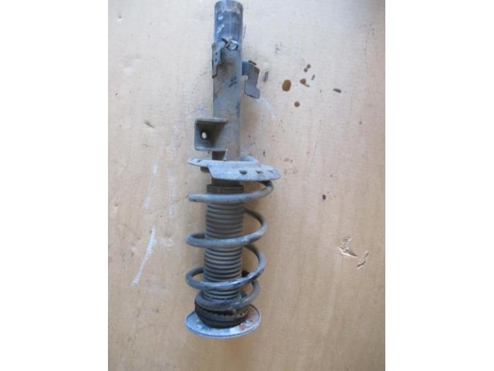 Fronts shock absorber, left from a Land Rover Range Rover Evoque (LVJ/LVS)  2012