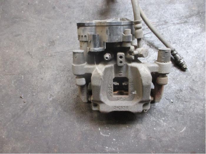 Rear brake calliper, left from a Land Rover Range Rover Evoque (LVJ/LVS) 2.0 D 150 16V 5-drs. 2017