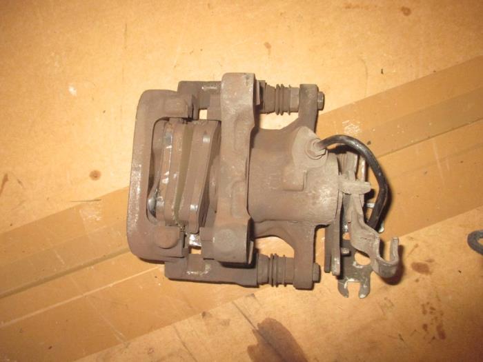 Gebrauchte Bremszange links hinten Volkswagen Caddy Combi IV 2.0 TDI 102 Preis € 30,25 Mit Mehrwertsteuer angeboten von Garage Callant