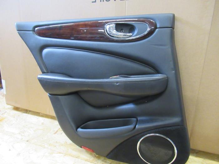 Rear door trim 4-door, left from a Jaguar XJ (X350) 2.7d V6 24V 2009