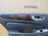 Rear door trim 4-door, left from a Jaguar XJ (X350) 2.7d V6 24V 2009