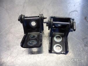 Used Rear door hinge, left Opel Corsa F (UB/UH/UP) 1.2 12V 75 Price € 12,10 Inclusive VAT offered by Garage Callant