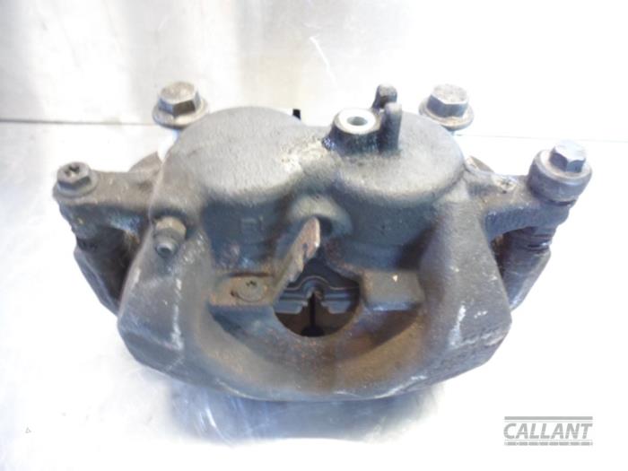 Front brake calliper, left from a Land Rover Discovery V (LR) 2.0 Td4 16V 2018