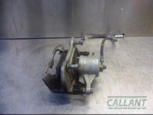 Used Front brake calliper, left Kia Ceed (CDB5/CDBB) 1.0i T-GDi 12V Price € 60,50 Inclusive VAT offered by Garage Callant