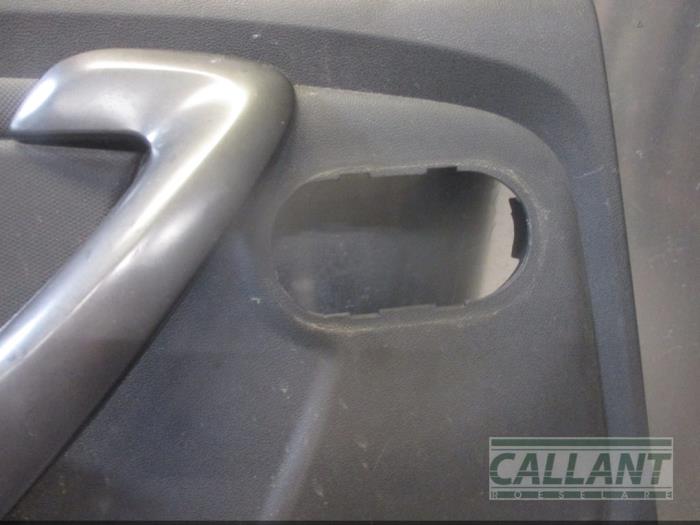 Rear door trim 4-door, left from a Dacia Duster (HS) 1.5 dCi 2015