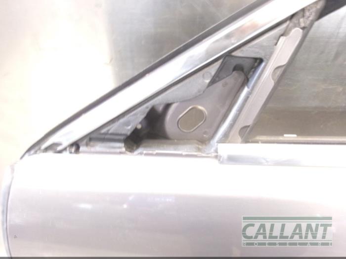 Door 4-door, front left from a Jaguar XF (CC9) 2.7 D V6 24V 2009