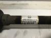 Front drive shaft, left from a Renault Clio III (BR/CR) 1.5 dCi FAP 2011