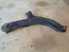 Front wishbone, left from a Renault Clio III (BR/CR), 2005 / 2014 1.2 16V 75, Hatchback, Petrol, 1.149cc, 55kW (75pk), FWD, D4F740; D4FD7; D4F706; D4F764; D4FE7, 2005-06 / 2014-12, BR/CR1J; BR/CRCJ; BR/CR1S; BR/CR9S; BR/CRCS; BR/CRFU; BR/CR3U; BR/CRP3 2010