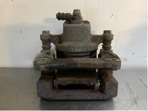 Used Rear brake calliper, left Mazda CX-7 Price on request offered by Autohandel-Smet Gebroeders NV