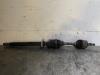 Front drive shaft, left from a Chevrolet Orlando (YYM/YYW), MPV, 2010 / 2015 2011