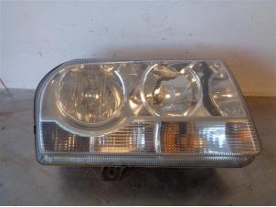 Used Headlight, right Chrysler 300 C Price on request offered by Autohandel-Smet Gebroeders NV