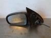 Wing mirror, left from a Opel Corsa 2001