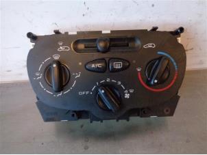 Used Air conditioning control panel Peugeot 206+ (2L/M) 1.1 XR,XS GPL Price on request offered by Autohandel-Smet Gebroeders NV