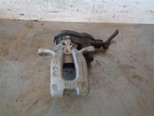 Used Rear brake calliper, left Opel Corsa F (UB/UH/UP) 1.2 12V 100 Price on request offered by Autohandel-Smet Gebroeders NV