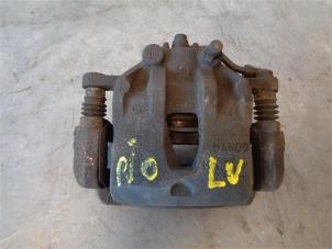 Used Front brake calliper, left Kia Rio III (UB) 1.2 CVVT 16V Price on request offered by Autohandel-Smet Gebroeders NV