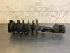 Fronts shock absorber, left from a Opel Combo, 2012 / 2018 1.3 CDTI 16V ecoFlex, Delivery, Diesel, 1.248cc, 66kW (90pk), FWD, A13FD, 2012-02 / 2018-12 2014