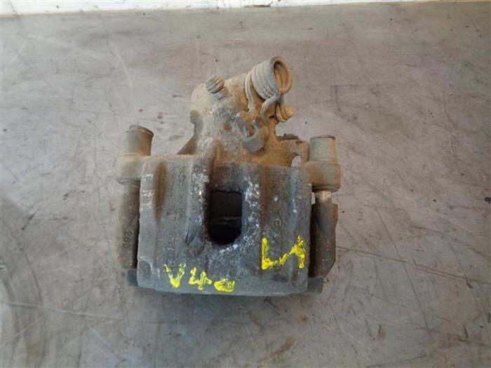 Rear brake calliper, left from a Volvo V40 (MV) 2.0 D2 16V 2018