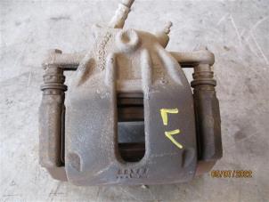Used Front brake calliper, left Dacia Duster (HS) 1.6 16V Hi-Flex Price on request offered by Autohandel-Smet Gebroeders NV