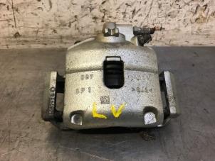 Used Front brake calliper, left Opel Corsa E 1.2 16V Price on request offered by Autohandel-Smet Gebroeders NV