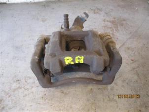 Used Rear brake calliper, right Ford Transit Price on request offered by Autohandel-Smet Gebroeders NV