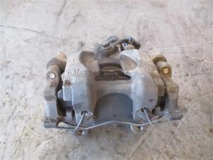 Used Rear brake calliper, left Volkswagen Passat (3G2) 1.6 TDI 16V Price on request offered by Autohandel-Smet Gebroeders NV
