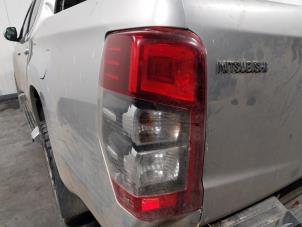 Used Taillight, left Mitsubishi L200 Price on request offered by Autohandel-Smet Gebroeders NV
