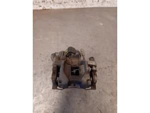 Used Rear brake calliper, left Ford Focus 4 1.0 Ti-VCT EcoBoost 12V 125 Price on request offered by Autohandel-Smet Gebroeders NV
