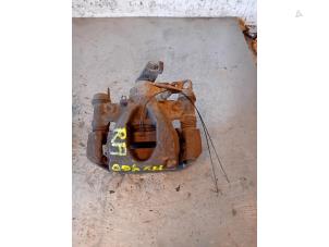Used Rear brake calliper, right Nissan NV 400 (M9J) 2.3 dCi 100 16V Price on request offered by Autohandel-Smet Gebroeders NV