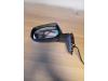 Wing mirror, left from a Toyota Auris (E15) 1.33 Dual VVT-I 16V 2011