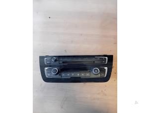 Used Air conditioning control panel BMW 1 serie (F20) 118i 1.5 TwinPower 12V Price on request offered by Autohandel-Smet Gebroeders NV