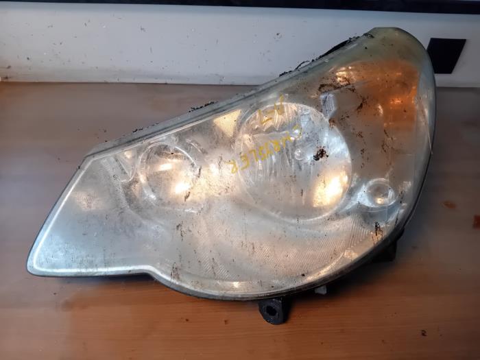 Używane Reflektor lewy Chrysler Sebring (JR) 2.0 16V Cena na żądanie oferowane przez Autohandel-Smet Gebroeders NV