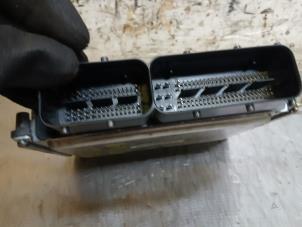 Engine management computer from a Volkswagen Golf VIII Variant (GC5) 1.0 TSI 12V 2021