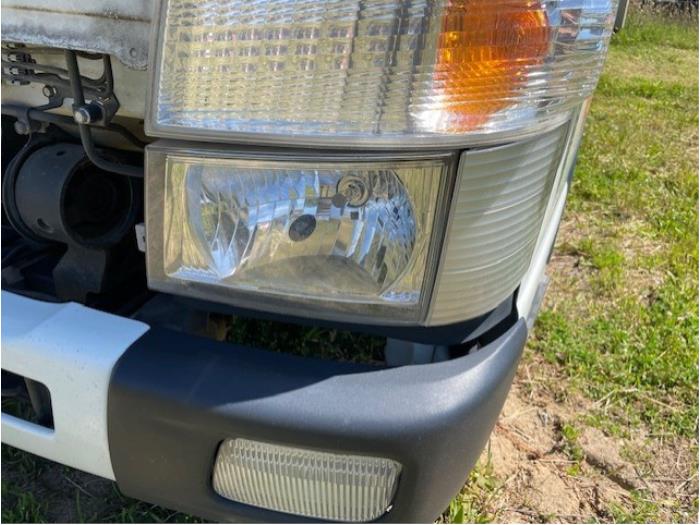 Używane Reflektor lewy Mitsubishi Canter Cena € 242,00 Z VAT oferowane przez Autohandel-Smet Gebroeders NV