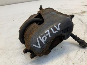 Used Front brake calliper, left Volkswagen Up! (121) 1.0 12V 75 Price € 25,00 Margin scheme offered by Autodemontage van der Iest