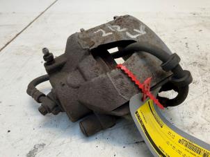 Used Front brake calliper, left Volkswagen Polo V (6R) 1.6 TDI 16V 75 Price € 27,50 Margin scheme offered by Autodemontage van der Iest