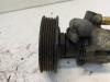 Power steering pump from a Volkswagen Polo III (6N1) 1.4i 60 1997