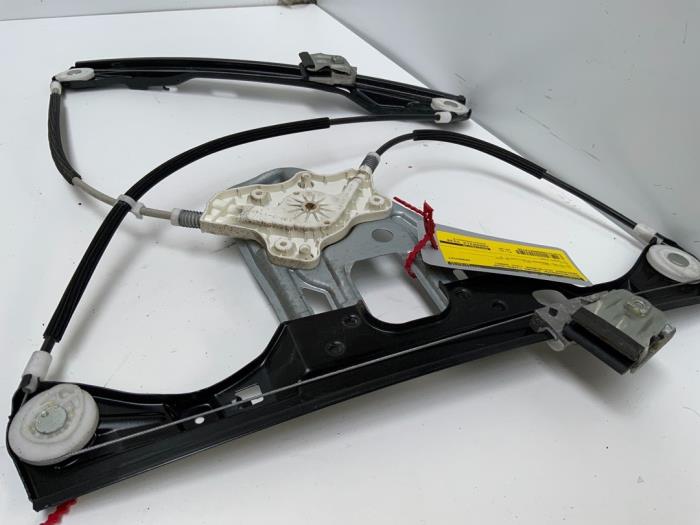 Door electric window regulator