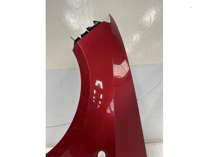 Front wing, left from a Seat Ibiza IV (6J5) 1.2 TDI Ecomotive 2011